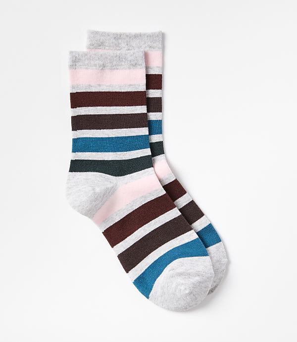 A pair of striped socks with pink, brown, teal, and gray bands rests on a plain white background.