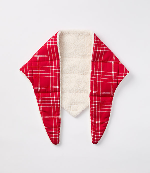 A red and white plaid neck warmer with a fluffy white lining lies flat against a plain white background.