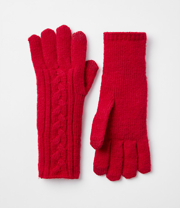 A pair of bright red cable-knit gloves rests on a plain white background.
