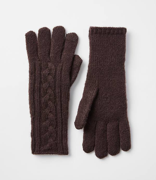 A pair of brown cable-knit gloves with ribbed cuffs rests on a plain white background.