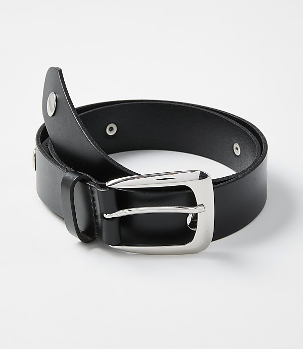 A black leather belt with a silver buckle is coiled on a plain white background.