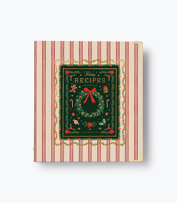 A holiday recipe archive folio with a festive wreath design sits centered against a red and white striped background.