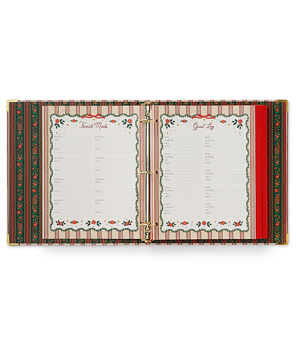 An open holiday-themed planner with "Favorite Meals" and "Guest Log" pages sits against a plain white background.