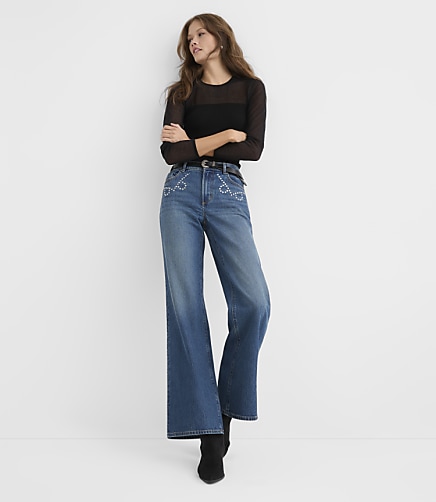 Rivete Tall Studded Mid Rise Loose Flare Jeans in Bright Mid Indigo Wash - Bright Mid Indigo Wash