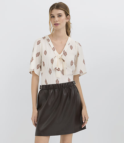 Side Buckle Faux Leather Mini Skirt
