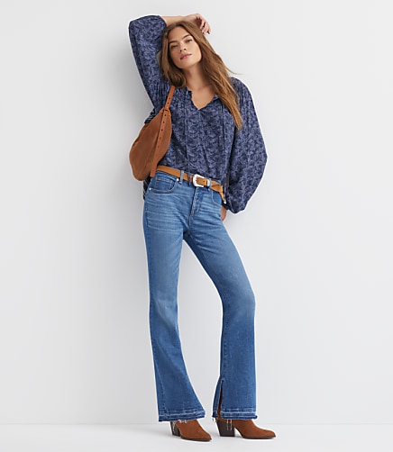 Split Unpicked Hem Mid Rise Boot Jeans in Bright Medium Stone Wash