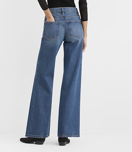 Rivete Tall Studded Mid Rise Loose Flare Jeans in Bright Mid Indigo Wash - Bright Mid Indigo Wash