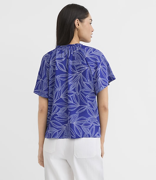 Leafed Ruffle Tie Neck Mixed Media Blouse