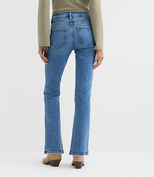 Rivete Curvy Mid Rise Boot Jeans in Vintage Mid Wash