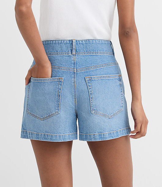 Rivete Petite Double Shank High Rise Denim Shorts in Mid Wash