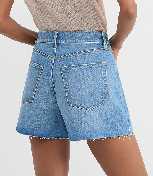 Rivete Petite Curvy High Rise Cut Off Denim Shorts in Mid Wash
