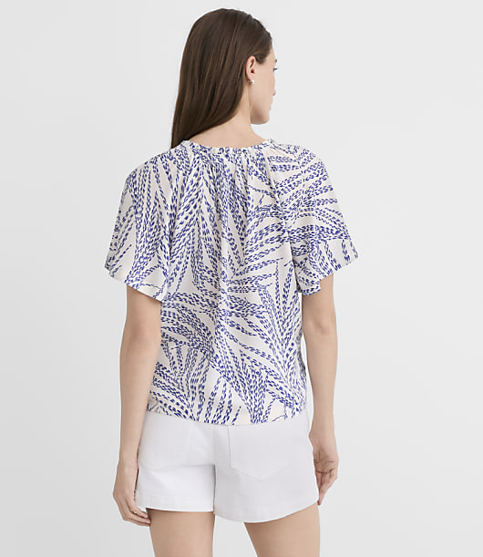 Leafed Ruffle Tie Neck Mixed Media Blouse