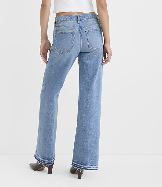 Rivete Petite Let Down Hem Low Rise Wide Leg Jeans in Aura Wash